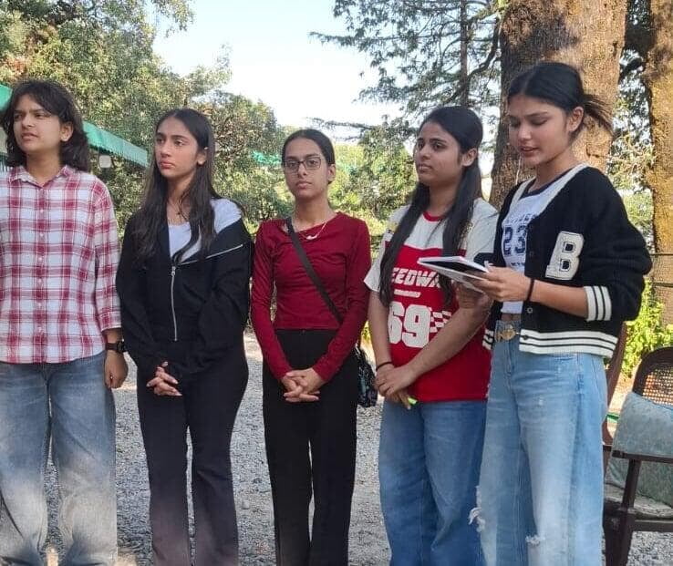 Young people engaged in reflection and conversation during an Acrophile Foundation experience