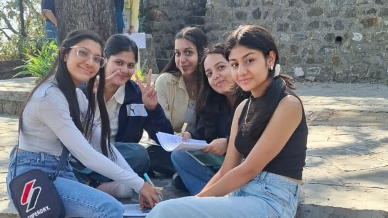 Young people taking part in a reflective outdoor activity